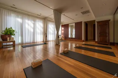 a yoga room with several mats on the floor at Chateau Okanagan in Kelowna