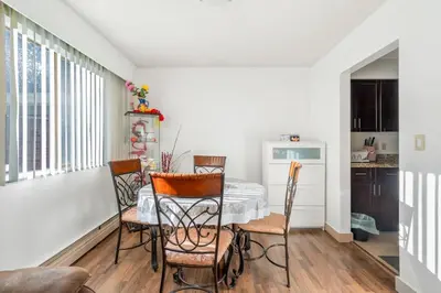 a dining room with a table and chairs at Central Vancouver 1BR Close to Transit in Vancouver