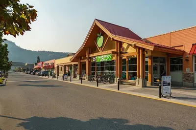 a street scene of a town with a store at Queen bedroom suite with private bathroom and independent entrance in Kelowna