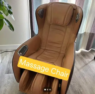 a massage chair sitting on the floor in a room at Ultimate Family Retreat Beach, Hot Tub & Games in Windermere