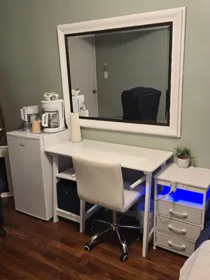 a white desk with a mirror and a chair at Private Entrance OFFICE SPACE King Suite in Mission City