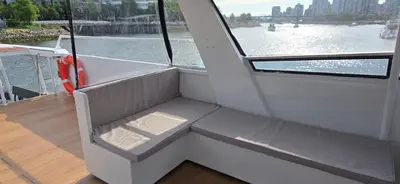 a seat on the back of a boat on the water at Shangri-la Joy in Vancouver