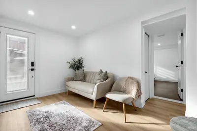 a living room with a couch and a chair at Shanaz house in Vancouver