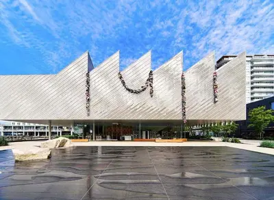 a large white building with a sign on it at Modern Bright Suite Self Check-In in North Vancouver
