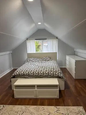 a bedroom with a bed and a window at Super bright and beautiful home with all you need in Delta