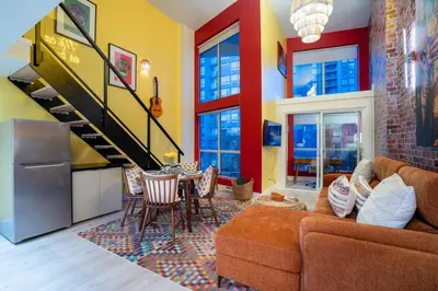 a living room with a couch and a table at Casa DT Vancouver - Mexican Theme in Vancouver