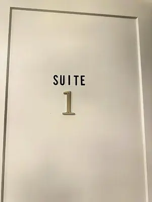 a white door with the number one on it at Luxury 2-Bedroom Suite at Bear Mountain Victoria in Langford