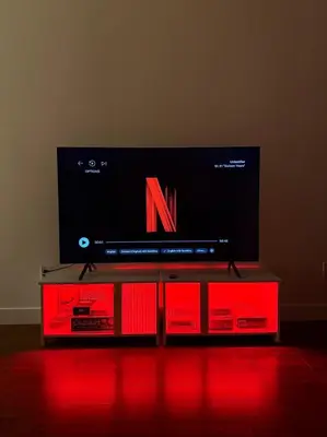 a flat screen tv sitting on top of a entertainment center at Private 1BR, AC, Strong Wi-Fi, Netflix and Amazon Prime in Victoria