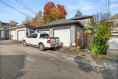 a white truck parked in front of a house at Your Next Stay Spacious Bright & Sophisticated in Vancouver