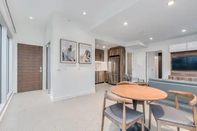 a living room with a table and chairs at Upscale 1BR2BA Walk Everywhere in Vancouver