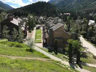 an aerial view of a village in the mountains at Panorama Mountain Resort - Horsethief Lodge with Fairmont Creek in Panorama