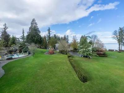 an aerial view of a large green yard with trees at Pacific Shores Resort & Spa in Nanoose Bay