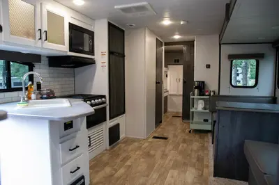 a kitchen with a sink and a counter at Jasper Gates Resort in Jasper