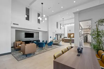 a living room with a table and chairs at Holiday Inn Hotel & Suites Surrey East - Cloverdale by IHG in Surrey