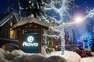 aania sign in the snow in front of a building at Aava Whistler Hotel in Whistler