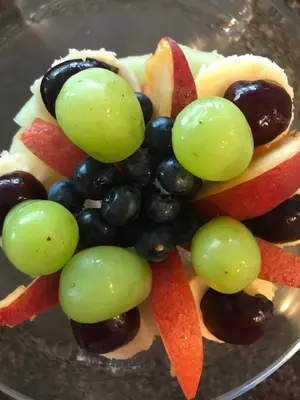 a plate of fruit and vegetables on a plate at Donna's Bed & Breakfast in White Rock