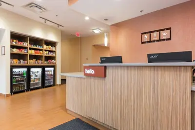 a lobby of a mcdonalds store with a cash counter at TownePlace Suites by Marriott Edmonton South in Edmonton