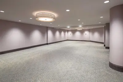 an empty room with a large room with purple walls at Sheraton Vancouver Airport Hotel in Richmond