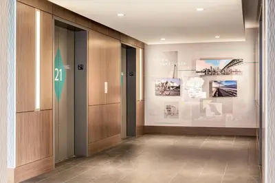 a hallway of a building with a sign on the wall at Civic Hotel, Autograph Collection in Surrey