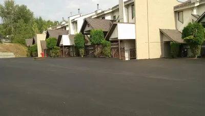an empty parking lot in front of a building at Mountain Edge our Holiday Home in Kimberley