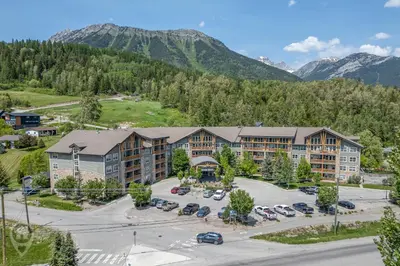 an aerial view of a resort with a parking lot at Silver Rock by StayIn in Fernie