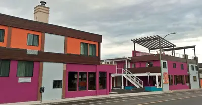 a group of buildings on a city street at Hotel Zed Kelowna in Kelowna