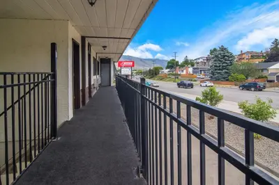 a balcony of a building with a view of a street at Canadas Best Value Inn & Suites Kamloops in Kamloops