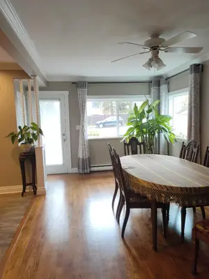 a dining room with a table and chairs at Semi Centre House in White Rock