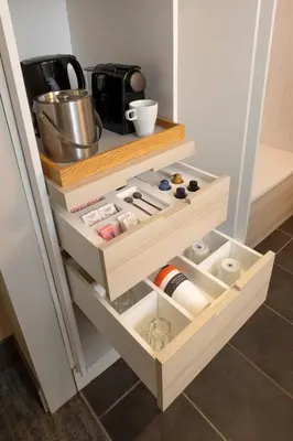 a drawer in a refrigerator filled with food at Banff Aspen Lodge in Banff