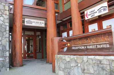 a building with a sign for a recreation guest suites at Beautiful Condo In A Great Location, Oceanfront Complex - Oe in Ucluelet