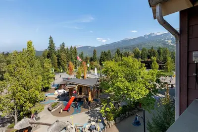 an aerial view of a resort with a playground at Tyndall Stone Lodge by Whiski Jack in Whistler