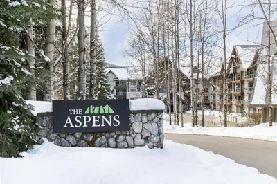 a sign for the akuma as systems in the snow at The Aspens by Whiski Jack in Whistler
