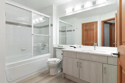 a bathroom with a sink and a toilet and a shower at Northstar at Stoney Creek by Whiski Jack in Whistler