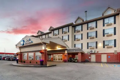 a rendering of a hotel in a parking lot at Best Western Grande Prairie in Grande Prairie