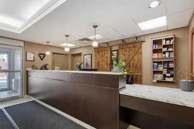 a barber shop with a counter in a room at Best Western Plus Red Deer Inn & Suite in Red Deer
