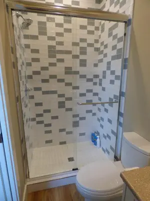 a bathroom with a shower with a toilet at Avatar by Eagle Reach Properties in Port Renfrew