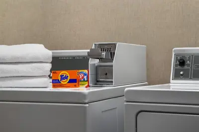 a kitchen with a white refrigerator and a microwave at Hampton Inn by Hilton Kamloops in Kamloops