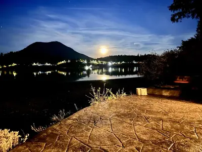 a view of a body of water at night at Private Oceanfront Cabin And Hot Tub! - Gww in Ucluelet