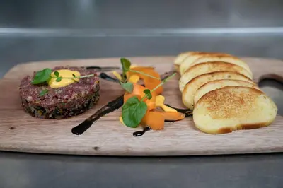 a plate of food with bread and vegetables on it at Spirit Ridge, in The Unbound Collection by Hyatt in Osoyoos