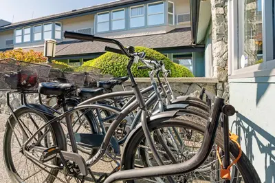 a group of bikes parked in front of a building at Best Western Plus Emerald Isle Hotel in Sidney
