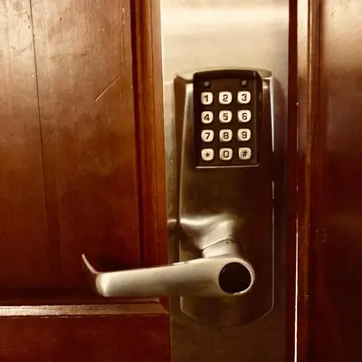 a doorhandle with a phone on a door at The Best Top Floor Ski-in/Ski-out at the Aspens in Whistler