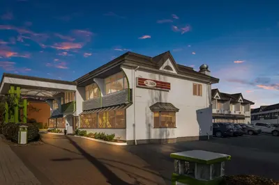 a rendering of the front of a hotel at SureStay by Best Western North Vancouver Capilano in North Vancouver