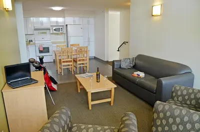 a living room with a couch and a table at UBC Okanagan Campus in Kelowna