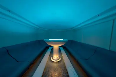 a room with a blue ceiling and a table at Sparkling Hill Resort and Spa - Adults-Only Resort in Vernon
