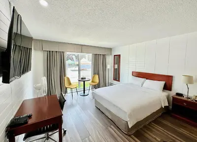 a hotel room with a bed and a desk at August Jack Inn in Squamish