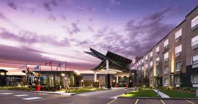 a building with a windmill in front of it at Best Western Plus Edmonton Airport Hotel in Leduc