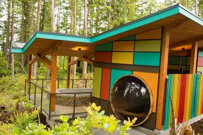 a colorful play house in the woods at Hotel Zed Tofino in Tofino