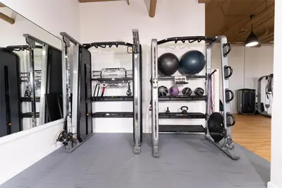 a gym with two sets at Prestige Harbourfront Resort, WorldHotels Luxury in Salmon Arm