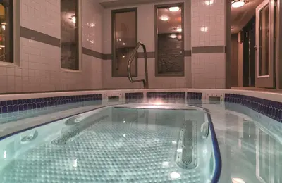 a jacuzzi tub in a hotel room with at Prestige Mountain Resort Rossland in Rossland