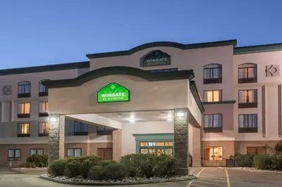 a rendering of a hotel with the front of the building at Wingate by Wyndham - Edmonton West in Edmonton